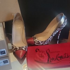 Christian Louboutin Leopard Print Pony with Red Cap Toe 100 Heel.